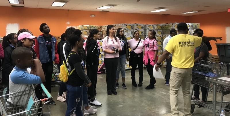 Hundreds of Volunteers Sort Food for Furloughed Federal Employees on MLK Day Of Service