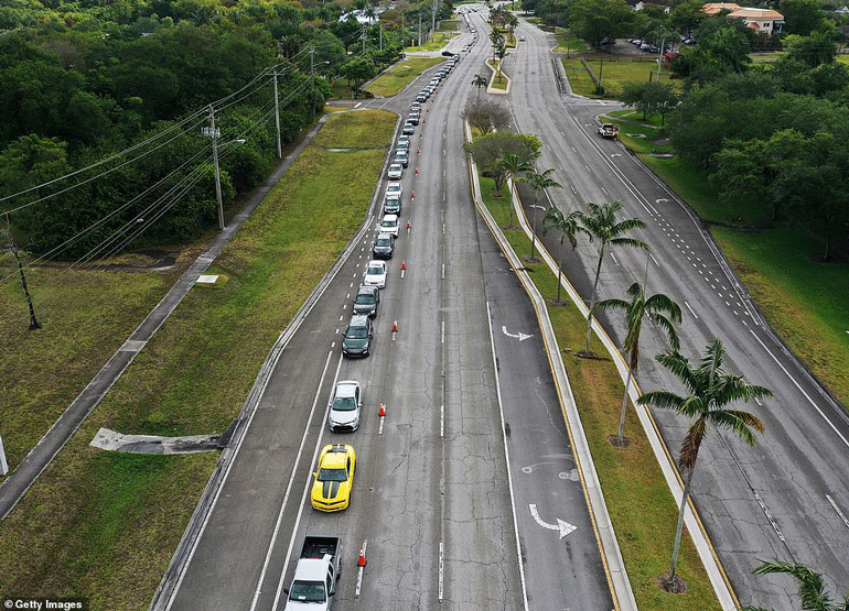 Miles-long row of cars waits near Florida food bank as demand surges