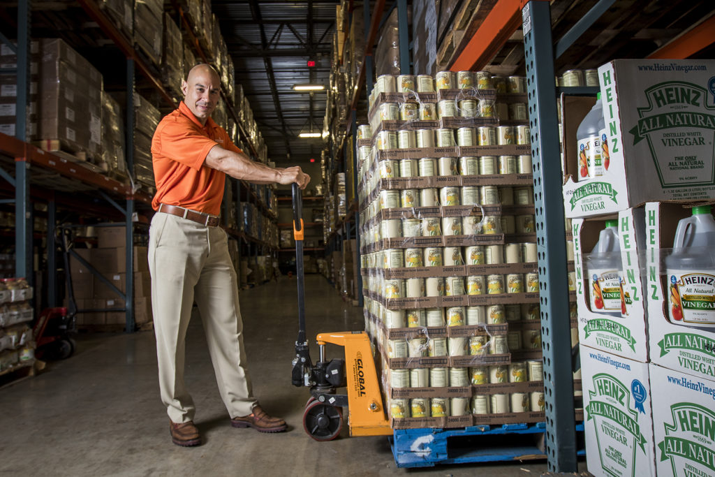 Paco Vélez with donated can goods